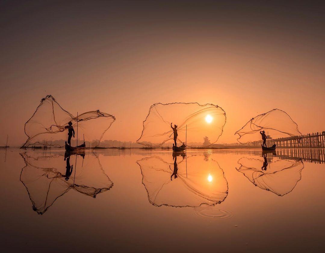  缅甸撒网捕鱼的渔民，来自摄影师Ilhan Eroglu。 
